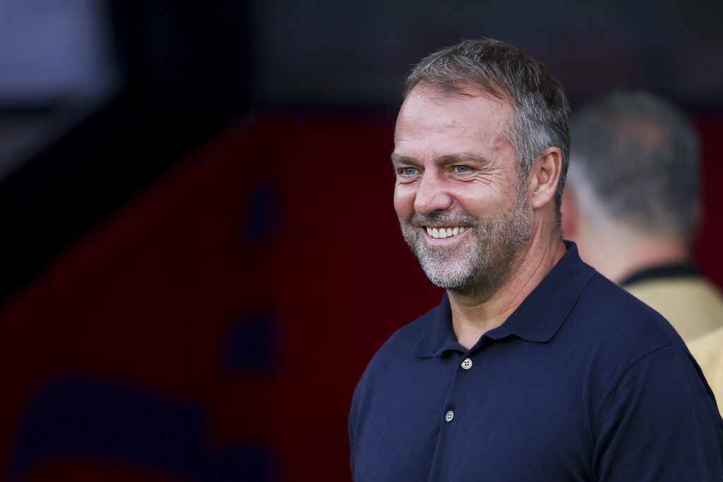 BARCELONA, SPAIN - AUGUST 12: Hansi Flick, head coach of FC Barcelona looks on prior to the Joan Gamper Trophy match between FC Barcelona and AS Monaco at Estadi Olimpic Lluis Companys on August 12, 2024 in Barcelona, Spain.