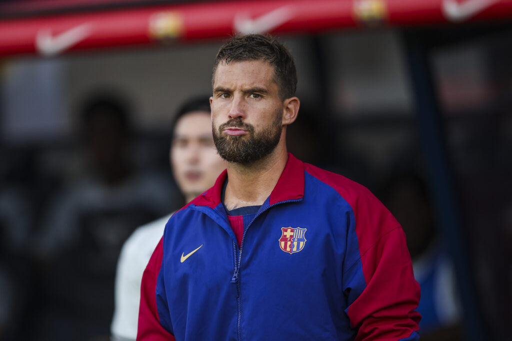 BARCELONA, SPAIN - AUGUST 12: Inigo Martinez of FC Barcelona looks on prior to the Joan Gamper Trophy match between FC Barcelona and AS Monaco at Estadi Olimpic Lluis Companys on August 12, 2024 in Barcelona, Spain.