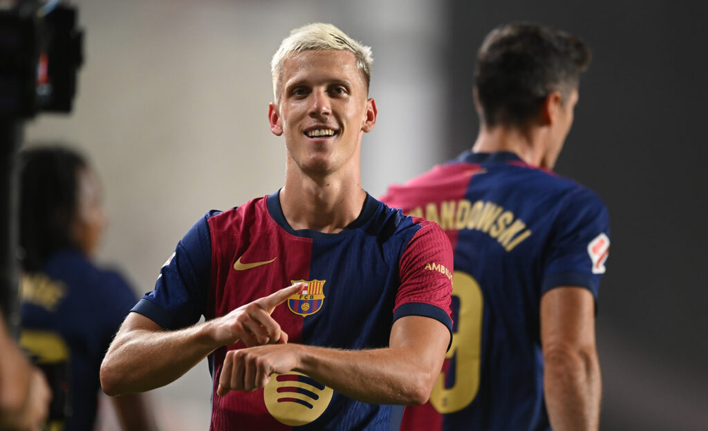 MADRID, SPAIN - AUGUST 27: Dani Olmo of FC Barcelona celebrates scoring his sides second goal during the La Liga match between Rayo Vallecano and FC Barcelona at Estadio de Vallecas on August 27, 2024 in Madrid, Spain.