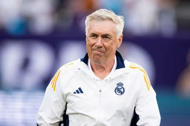 EAST RUTHERFORD, NEW JERSEY - AUGUST 3: Carlo Ancelotti, head coach of Real Madrid walks onto the pitch before in the pre-season friendly match against the FC Barcelona at MetLife Stadium on August 3, 2024 in East Rutherford, New Jersey.