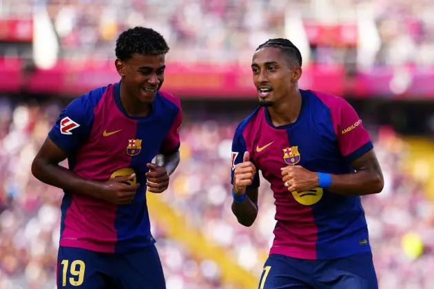 BARCELONA, SPAIN - AUGUST 31: Raphinha of FC Barcelona celebrates scoring his team's first goal with team mate Lamine Yamal during the La Liga match between FC Barcelona and Real Valladolid CF at Camp Nou on August 31, 2024 in Barcelona, Spain.