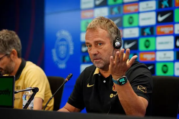 Barcelona's German coach Hansi Flick gestures during a press conference of the Spanish league football match between Valencia CF and FC Barcelona, at the Estadi Olimpic Lluis Companys in Barcelona on August 16, 2024.