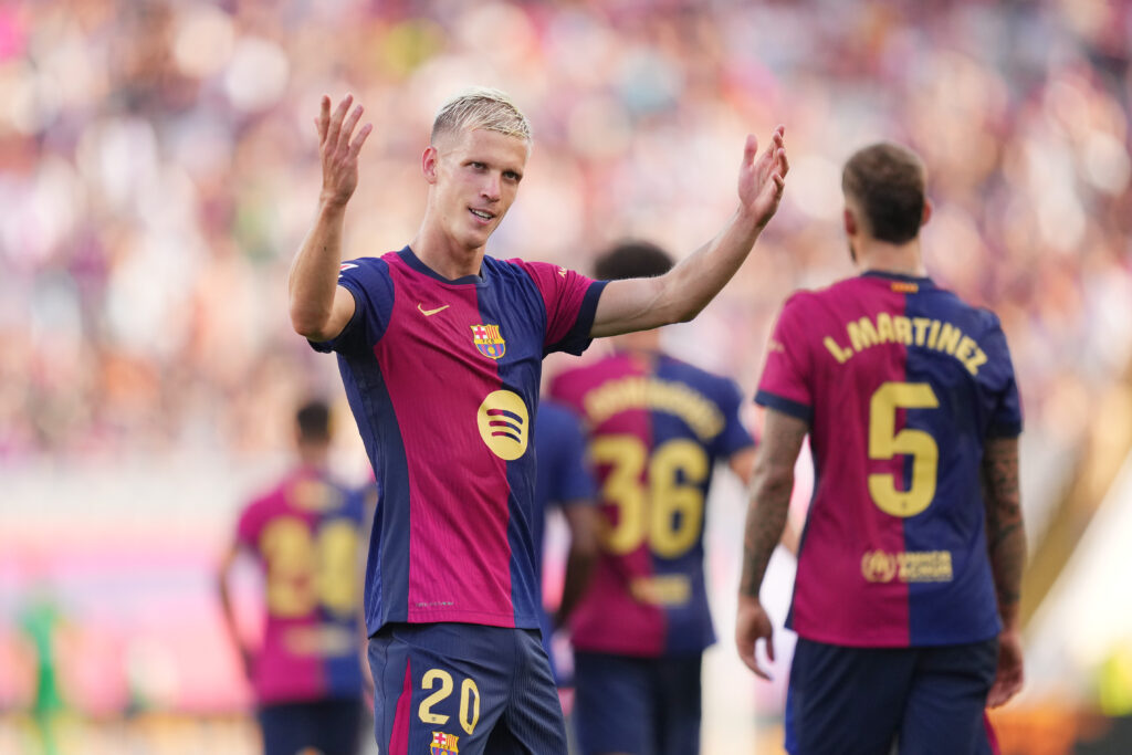 BARCELONA, SPAIN - AUGUST 31: Dani Olmo of FC Barcelona celebrates scoring his team's sixth goal during the La Liga match between FC Barcelona and Real Valladolid CF at Camp Nou on August 31, 2024 in Barcelona, Spain.