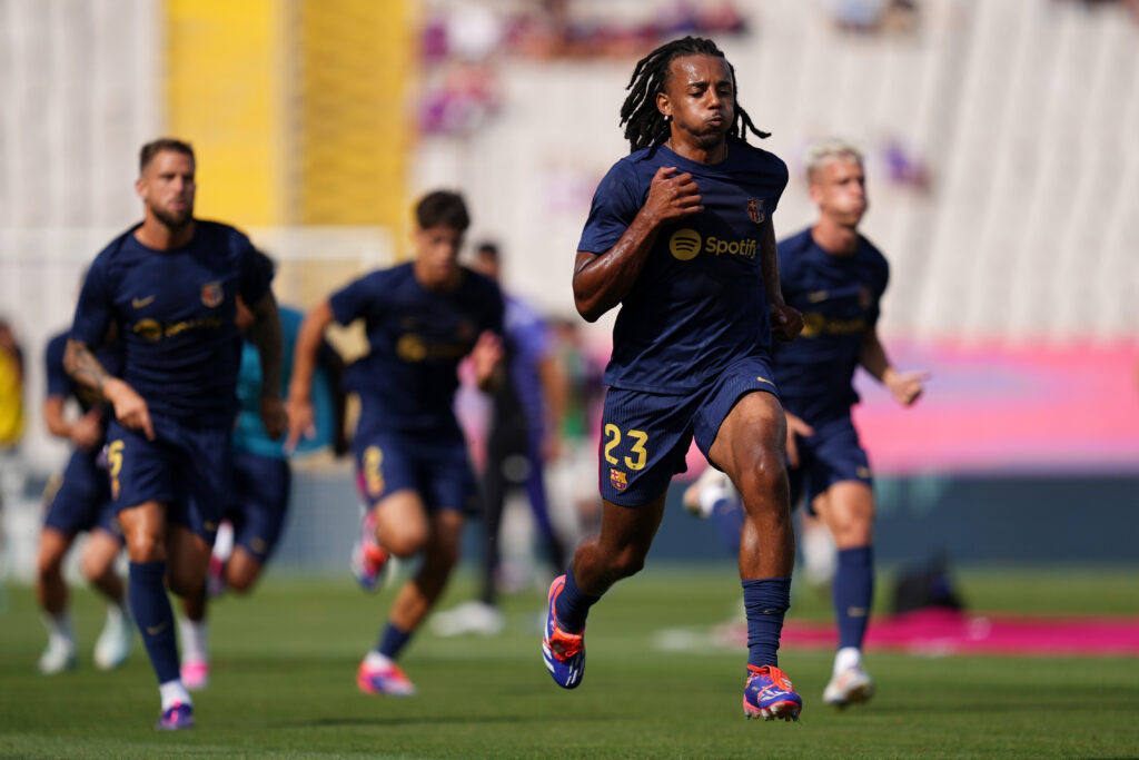 BARCELONA, SPAIN - AUGUST 31: Jules Kounde of FC Barcelona warms up prior to the La Liga match between FC Barcelona and Real Valladolid CF at Camp Nou on August 31, 2024 in Barcelona, Spain.