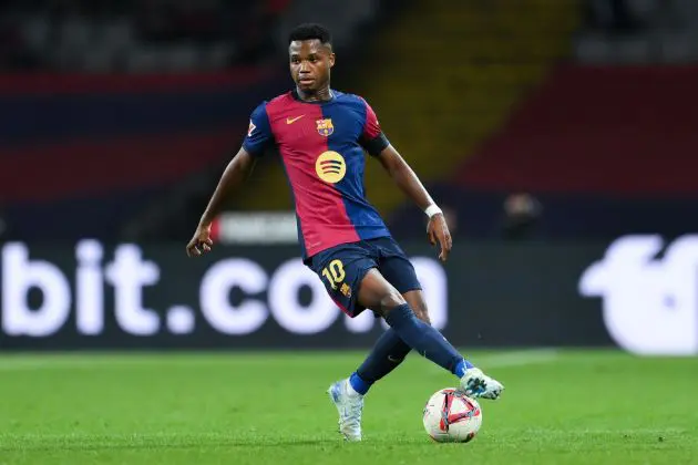 BARCELONA, SPAIN - OCTOBER 20: Ansu Fati of FC Barcelona runs with the ball during the La Liga EA Sports match between FC Barcelona and Sevilla FC at Estadi Olimpic Lluis Companys on October 20, 2024 in Barcelona, Spain.