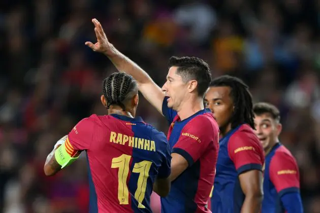 BARCELONA, SPAIN - OCTOBER 23: Robert Lewandowski of FC Barcelona celebrates scoring his team's second goal with teammates during the UEFA Champions League 2024/25 League Phase MD3 match between FC Barcelona and FC Bayern Munchen at Estadi Olimpic Lluis Companys on October 23, 2024 in Barcelona, Spain.