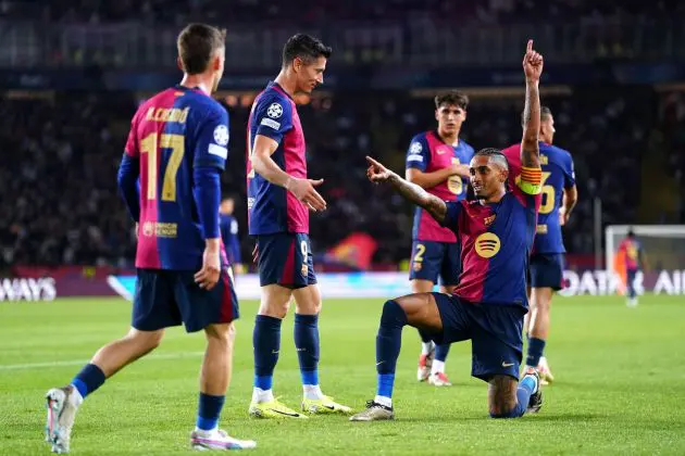 BARCELONA, SPAIN - OCTOBER 23: Raphinha of FC Barcelona celebrates scoring his team's fourth goal and his hat-trick goal with teammates during the UEFA Champions League 2024/25 League Phase MD3 match between FC Barcelona and FC Bayern Munchen at Estadi Olimpic Lluis Companys on October 23, 2024 in Barcelona, Spain.