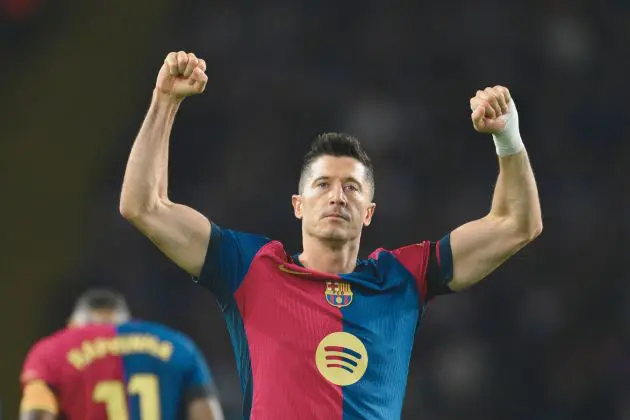 BARCELONA, SPAIN - OCTOBER 20: Robert Lewandowski of FC Barcelona celebrates scoring his team's second goal during the La Liga EA Sports match between FC Barcelona and Sevilla FC at Estadi Olimpic Lluis Companys on October 20, 2024 in Barcelona, Spain.