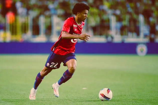 ISTANBUL, TURKEY - AUGUST 13: Tiago Santos of Lille runs with the ball during the UEFA Champions League Third Qualifying Round match between Fenerbahce and Lille FC at Ulker Stadium on August 13, 2024 in Istanbul, Turkey.