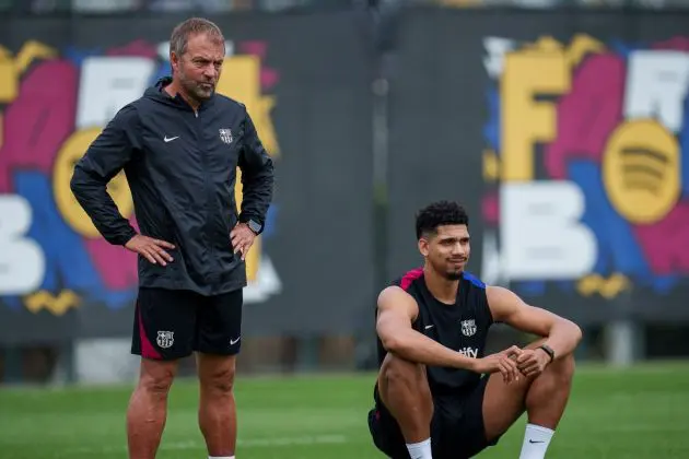 Barcelona defender Ronald Araujo with Hansi Flick.