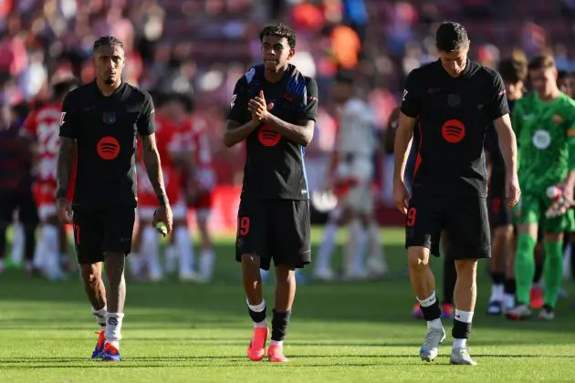 GIRONA, SPAIN - SEPTEMBER 15: Raphinha, Lamine Yamal and Robert Lewandowski of Barcelona FC acknowledge the crowd during the LaLiga match between Girona FC and FC Barcelona at Montilivi Stadium on September 15, 2024 in Girona, Spain.