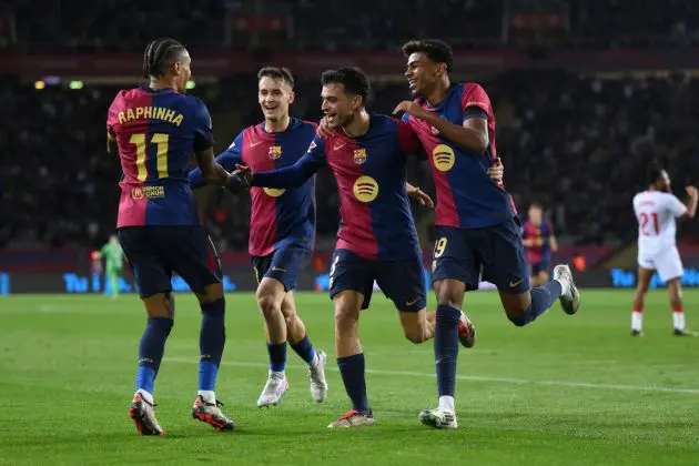 BARCELONA, SPAIN - OCTOBER 20: Pedri of FC Barcelona celebrates with teammates Raphinha, Marc Casado and Lamine Yamal after scoring his team's second goal during the La Liga EA Sports match between FC Barcelona and Sevilla FC at Estadi Olimpic Lluis Companys on October 20, 2024 in Barcelona, Spain.