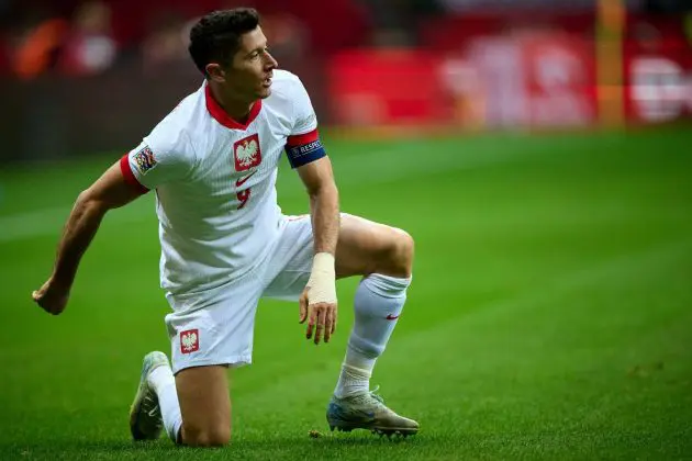 WARSAW, POLAND - OCTOBER 12: Robert Lewandowski of Poland lies a knee on the pitch during the UEFA Nations League 2024/25 League A Group A1 match between Poland and Portugal at PGE Narodowy on October 12, 2024 in Warsaw, Poland.