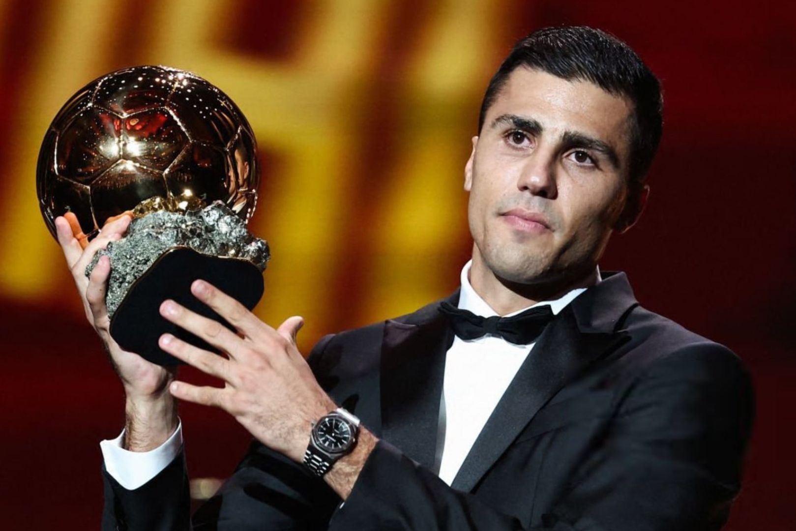 Manchester City's Spanish midfielder Rodri receives the Ballon d'Or award during the 2024 Ballon d'Or France Football award ceremony at the Theatre du Chatelet in Paris on October 28, 2024.