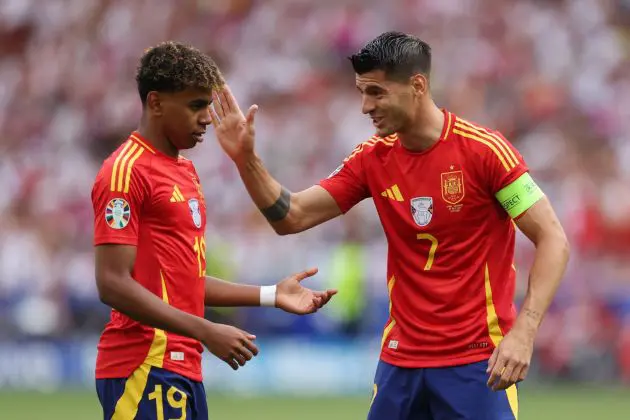 STUTTGART, GERMANY - JULY 05: Alvaro Morata of Spain interacts with Lamine Yamal of Spain during the UEFA EURO 2024 quarter-final match between Spain and Germany at Stuttgart Arena on July 05, 2024 in Stuttgart, Germany.