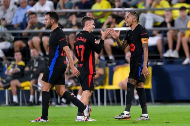 VILLARREAL, SPAIN - SEPTEMBER 22: Raphinha of FC Barcelona celebrates scoring his team's fifth goal with teammate Marc Casado during the LaLiga match between Villarreal CF and FC Barcelona at Estadio de la Ceramica on September 22, 2024 in Villarreal, Spain.