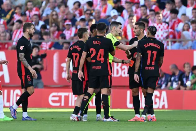 GIRONA, SPAIN - SEPTEMBER 15: Ferran Torres of FC Barcelona argues with referee Alejandro Muniz Ruiz, after receiving a red card during the LaLiga match between Girona FC and FC Barcelona at Montilivi Stadium on September 15, 2024 in Girona, Spain.