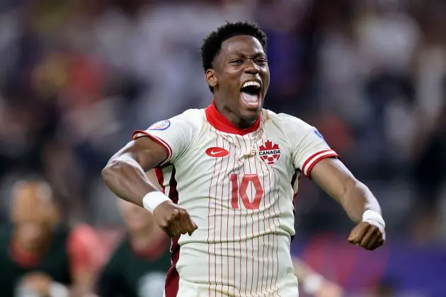 ARLINGTON, TEXAS - JULY 05: Jonathan David of Canada celebrates the victory after the CONMEBOL Copa America 2024 quarter-final match between Venezuela and Canada at AT&T Stadium on July 05, 2024 in Arlington, Texas.