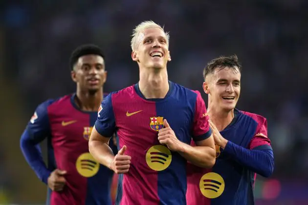 BARCELONA, SPAIN - NOVEMBER 03: Dani Olmo of FC Barcelona celebrates scoring his team's third goal with teammate Marc Casado during the La Liga EA Sports match between FC Barcelona and RCD Espanyol at Estadi Olimpic Lluis Companys on November 03, 2024 in Barcelona, Spain.