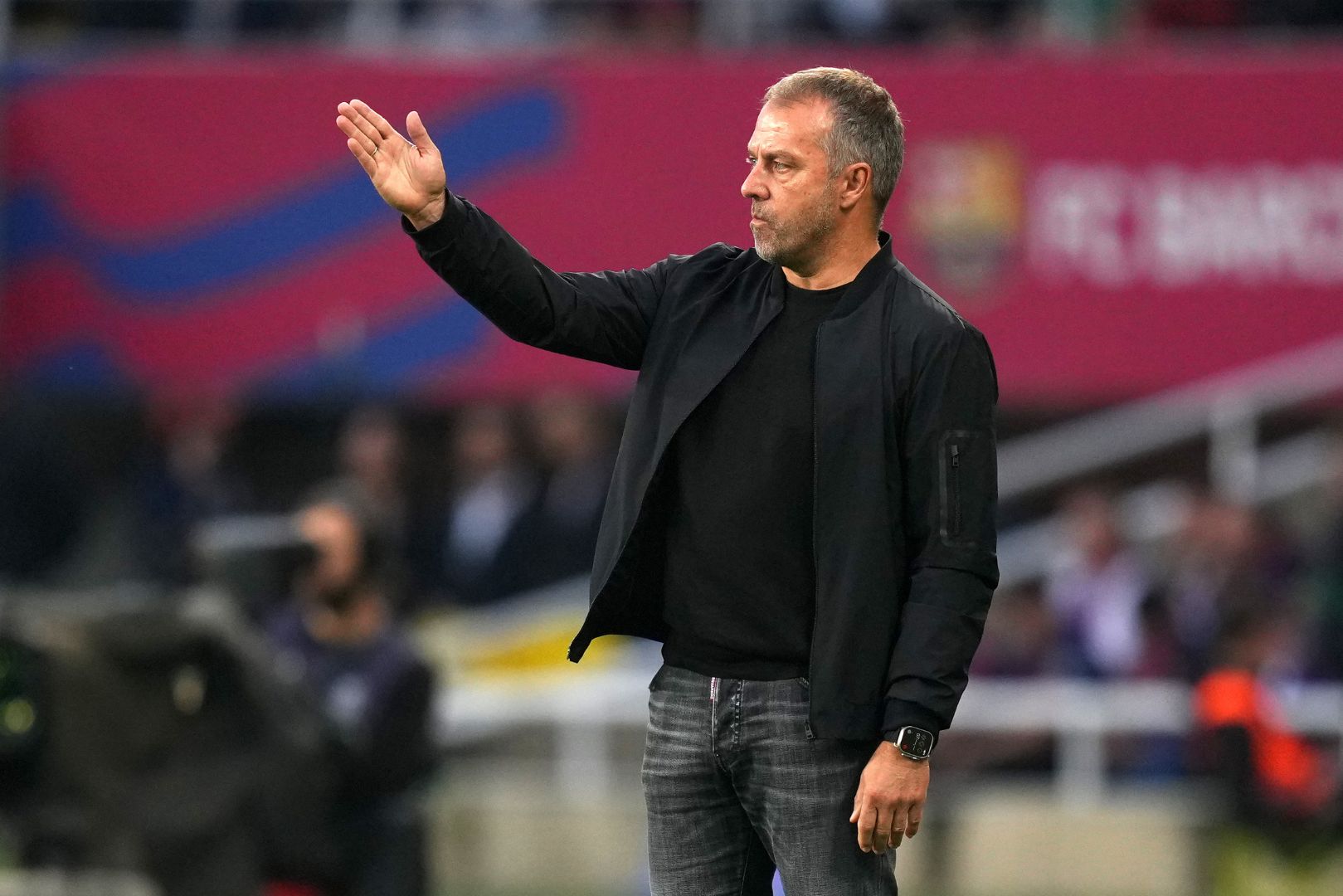 BARCELONA, SPAIN - NOVEMBER 03: Hansi Flick, Head Coach of FC Barcelona, gestures during the La Liga EA Sports match between FC Barcelona and RCD Espanyol at Estadi Olimpic Lluis Companys on November 03, 2024 in Barcelona, Spain.