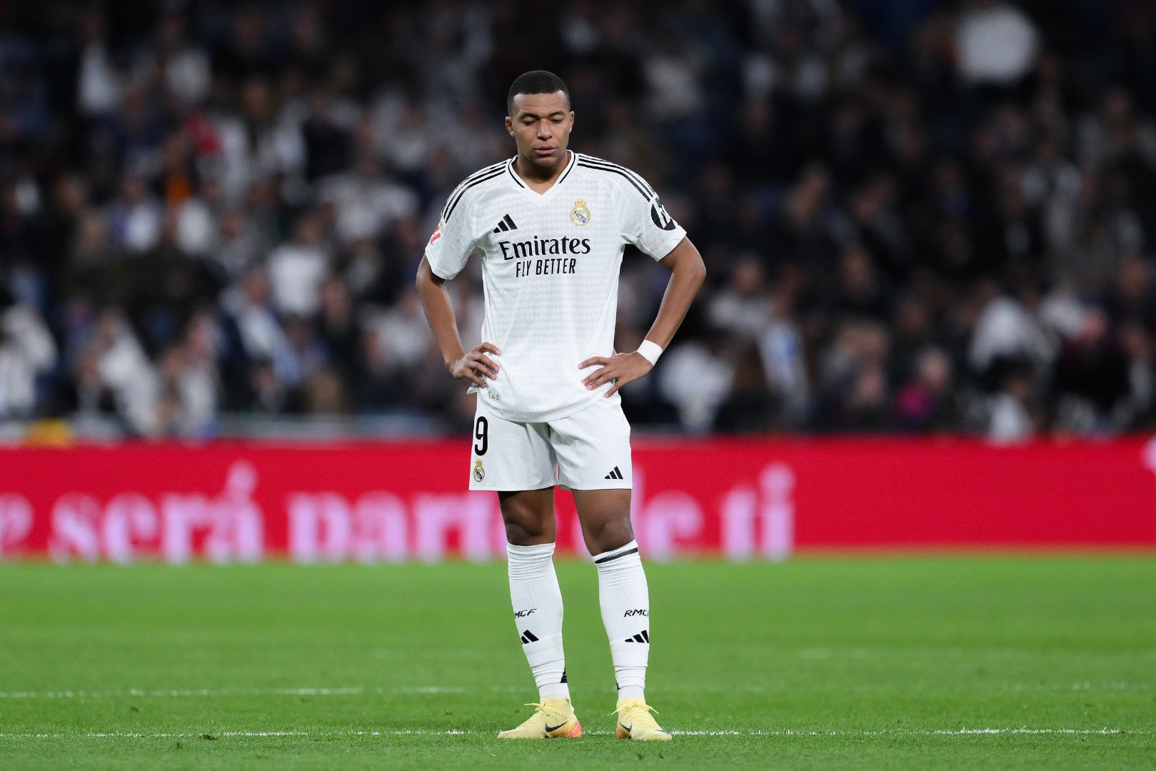 MADRID, SPAIN - OCTOBER 26: Kylian Mbappe of Real Madrid reacts following FC Barcelona's fourth goal, scored by Raphinha (not pictured) during the LaLiga match between Real Madrid CF and FC Barcelona at Estadio Santiago Bernabeu on October 26, 2024 in Madrid, Spain.