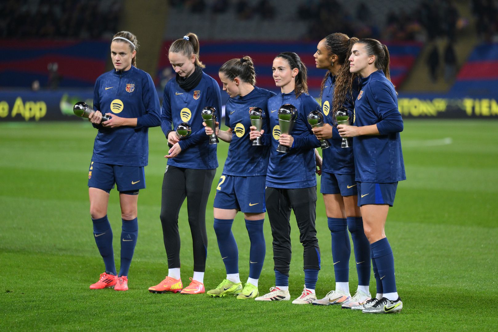 BARCELONA, SPAIN - DECEMBER 18: (L-R) Irene Paredes, Caroline Graham Hansen, Ona Batlle, Salma Paralluelo, Patri Guijarro and Aitana Bonmati of FC Barcelona pose for a photo whilst holding their The Best FIFA Women's 11 Award trophies prior to the UEFA Women's Champions League match between FC Barcelona and Manchester City at Estadi Johan Cruyff on December 18, 2024 in Barcelona, Spain.