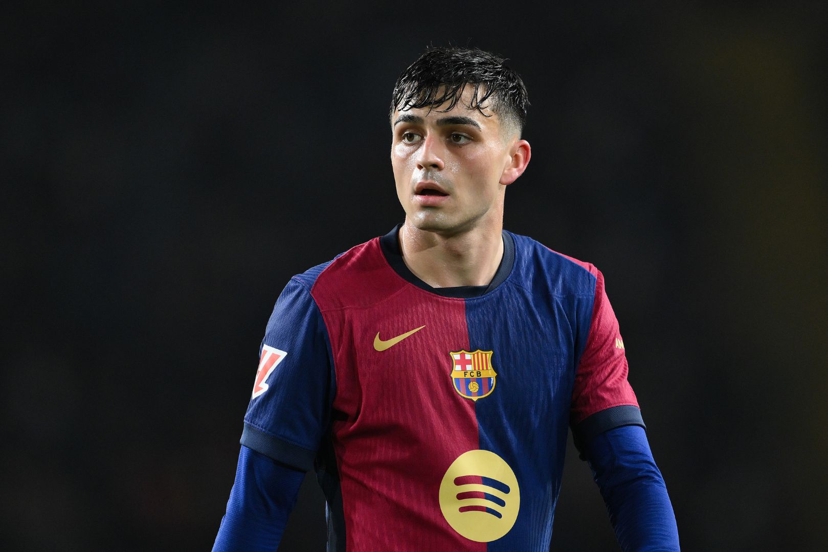 BARCELONA, SPAIN - FEBRUARY 17: Pedri of FC Barcelona looks on during the LaLiga match between FC Barcelona and Rayo Vallecano at Estadi Olimpic Lluis Companys on February 17, 2025 in Barcelona, Spain.