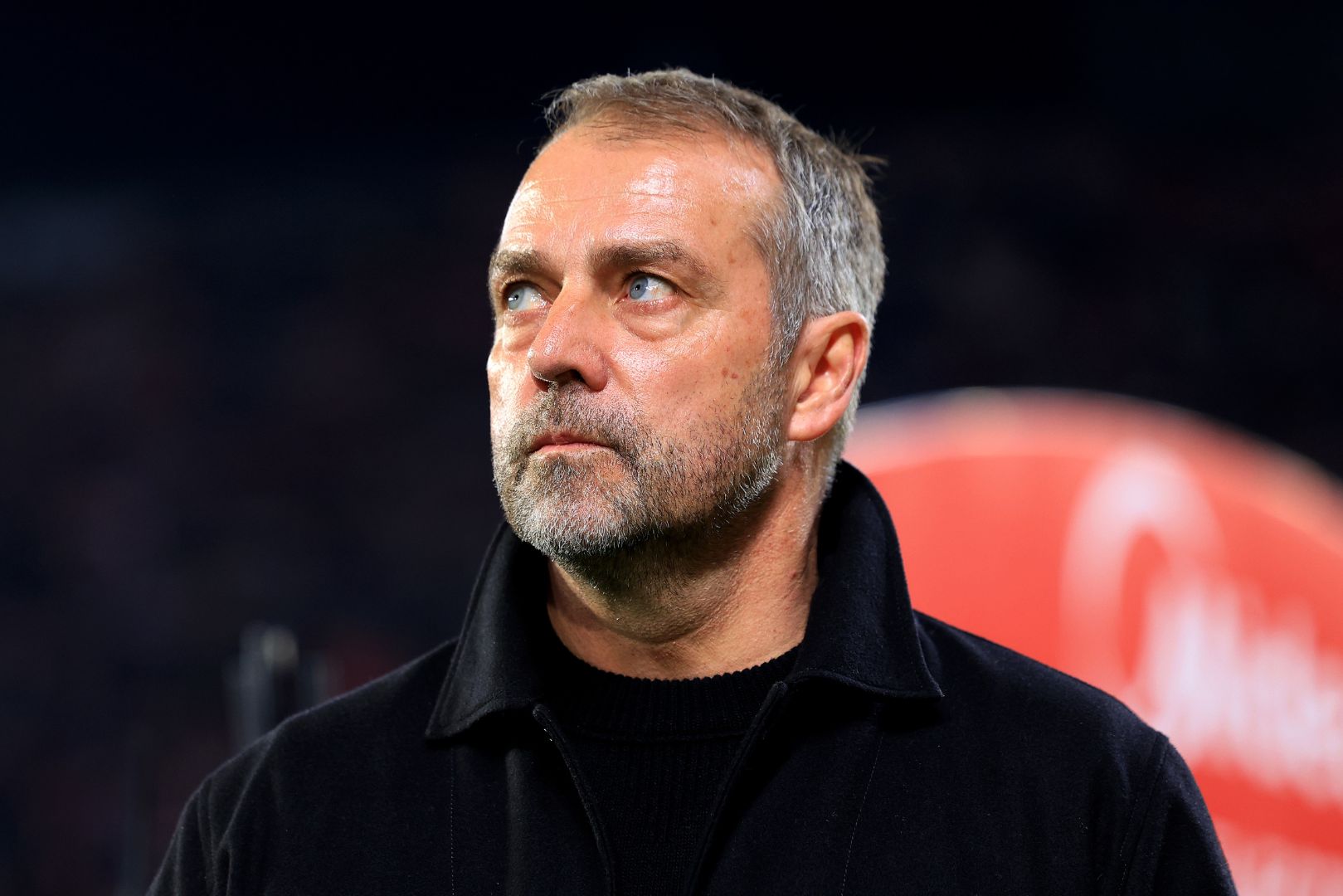 SEVILLE, SPAIN - FEBRUARY 09: Hansi Flick, Head Coach of FC Barcelona, looks on prior to the LaLiga match between Sevilla FC and FC Barcelona at Estadio Ramon Sanchez Pizjuan on February 09, 2025 in Seville, Spain.