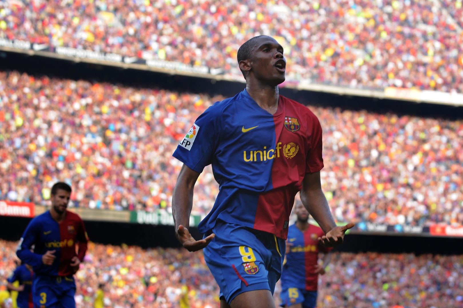 BARCELONA, SPAIN - MAY 10: Samuel Eto'o of Barcelona celebrates after scoring his team's second goal during the La Liga match between Barcelona and Villarreal at the Nou Camp stadium on May 10, 2009 in Barcelona, Spain.