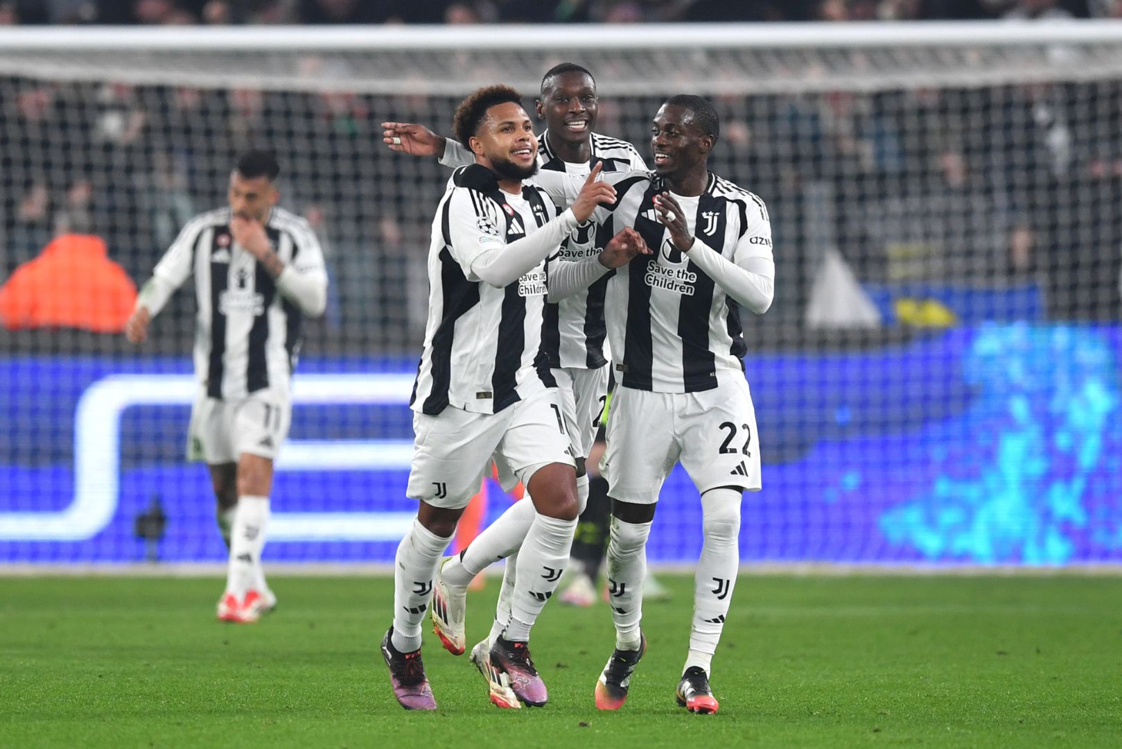 TURIN, ITALY - FEBRUARY 11: Weston McKennie of Juventus celebrates scoring his team's first goal with teammate Timothy Weah during the UEFA Champions League 2024/25 League Knockout Play-off first leg match between Juventus and PSV at Allianz Stadium on February 11, 2025 in Turin, Italy.
