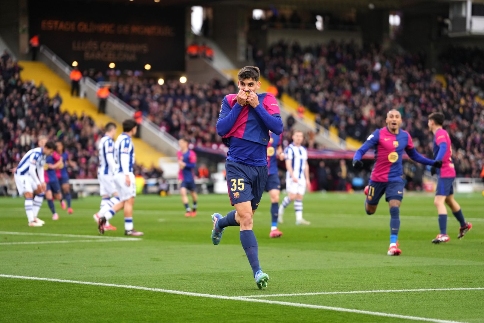 BARCELONA, SPAIN - MARCH 02: Gerard Martin of FC Barcelona celebrates scoring his team's first goal during the La Liga EA match between FC Barcelona and Real Sociedad at Estadi Olimpic Lluis Companys on March 02, 2025 in Barcelona, Spain.