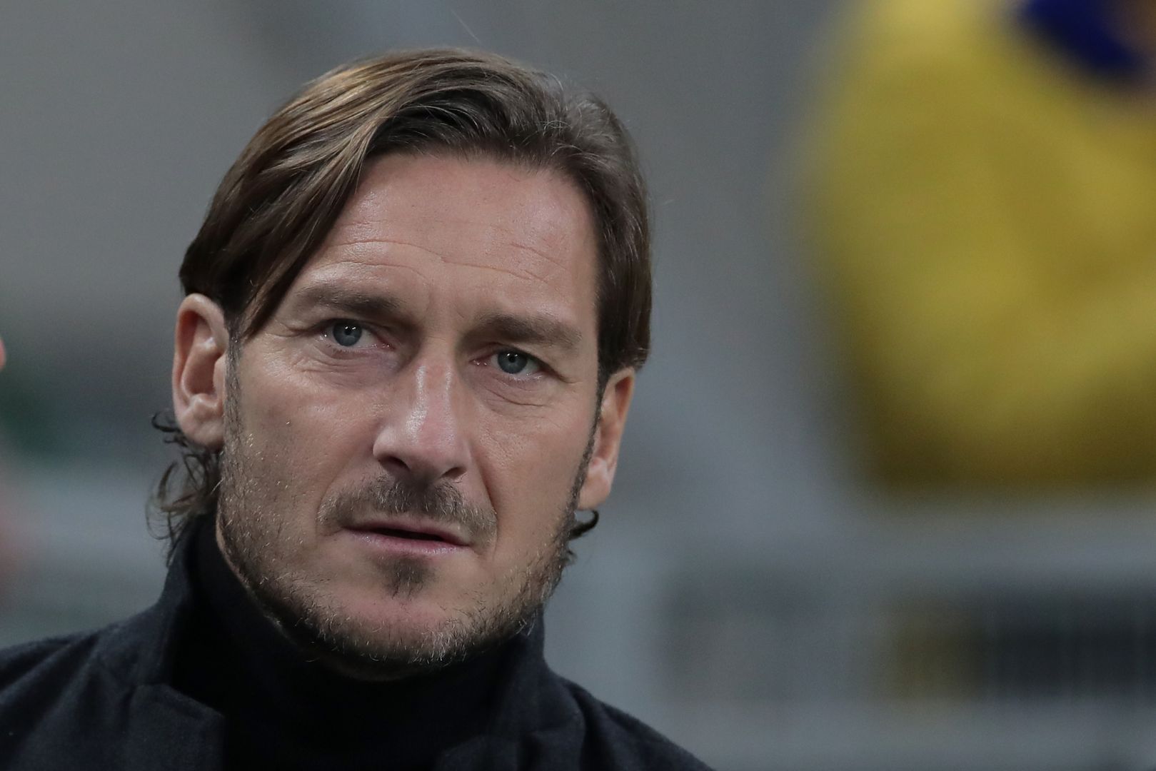 MILAN, ITALY - DECEMBER 06: AS Roma former player Francesco Totti looks on prior to the Serie A match between FC Internazionale and AS Roma at Stadio Giuseppe Meazza on December 6, 2019 in Milan, Italy.