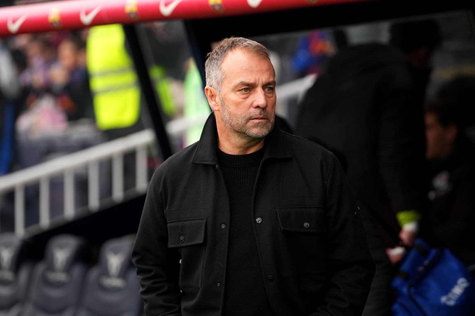 BARCELONA, SPAIN - MARCH 02: Hansi Flick, Head Coach of FC Barcelona, looks on prior to the La Liga EA match between FC Barcelona and Real Sociedad at Estadi Olimpic Lluis Companys on March 02, 2025 in Barcelona, Spain.