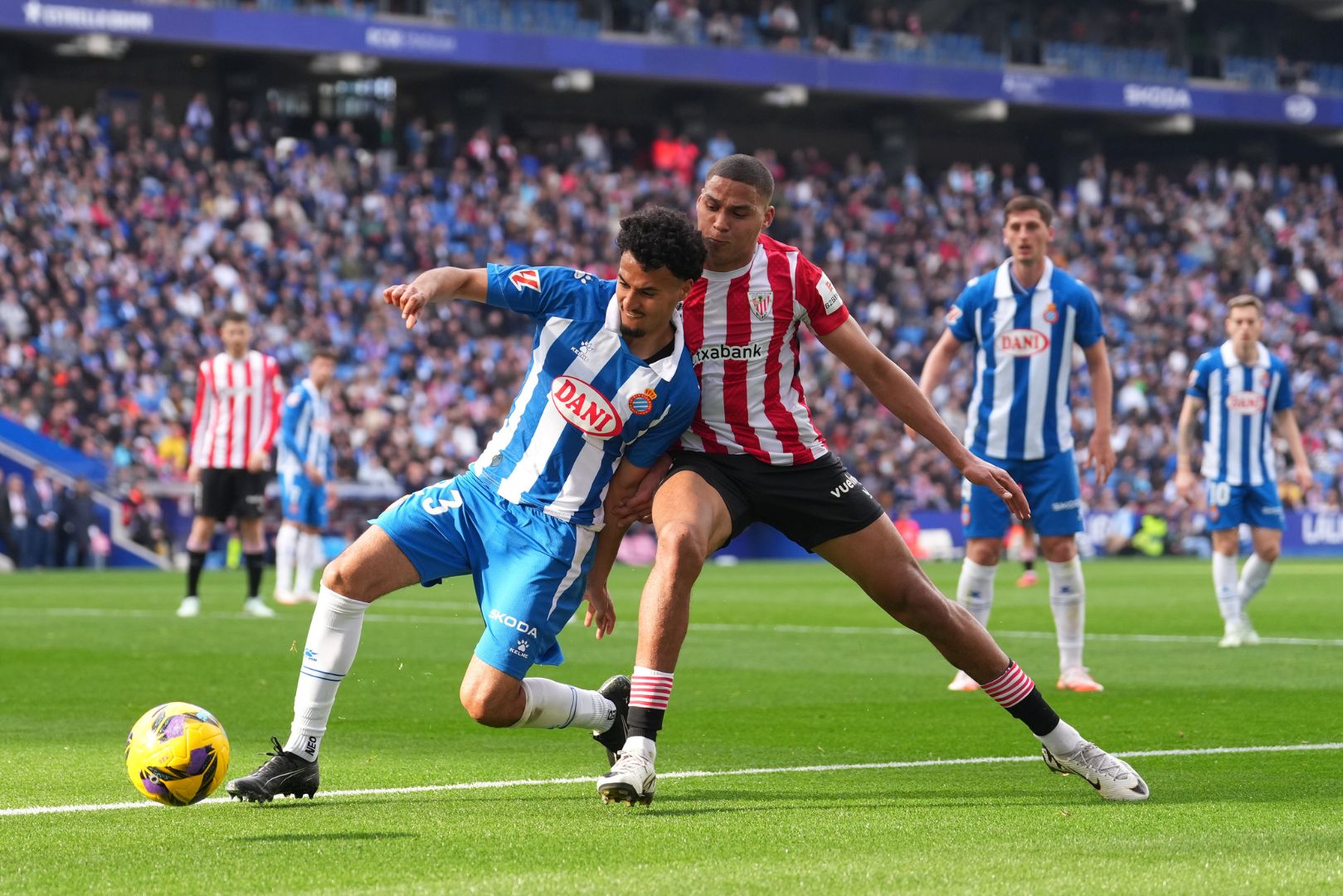 BARCELONA, SPAIN - FEBRUARY 16: Omar El Hilali of RCD Espanyol is challenged by Maroan Sannadi of Athletic Club during the LaLiga match between RCD Espanyol de Barcelona and Athletic Club at RCDE Stadium on February 16, 2025 in Barcelona, Spain.