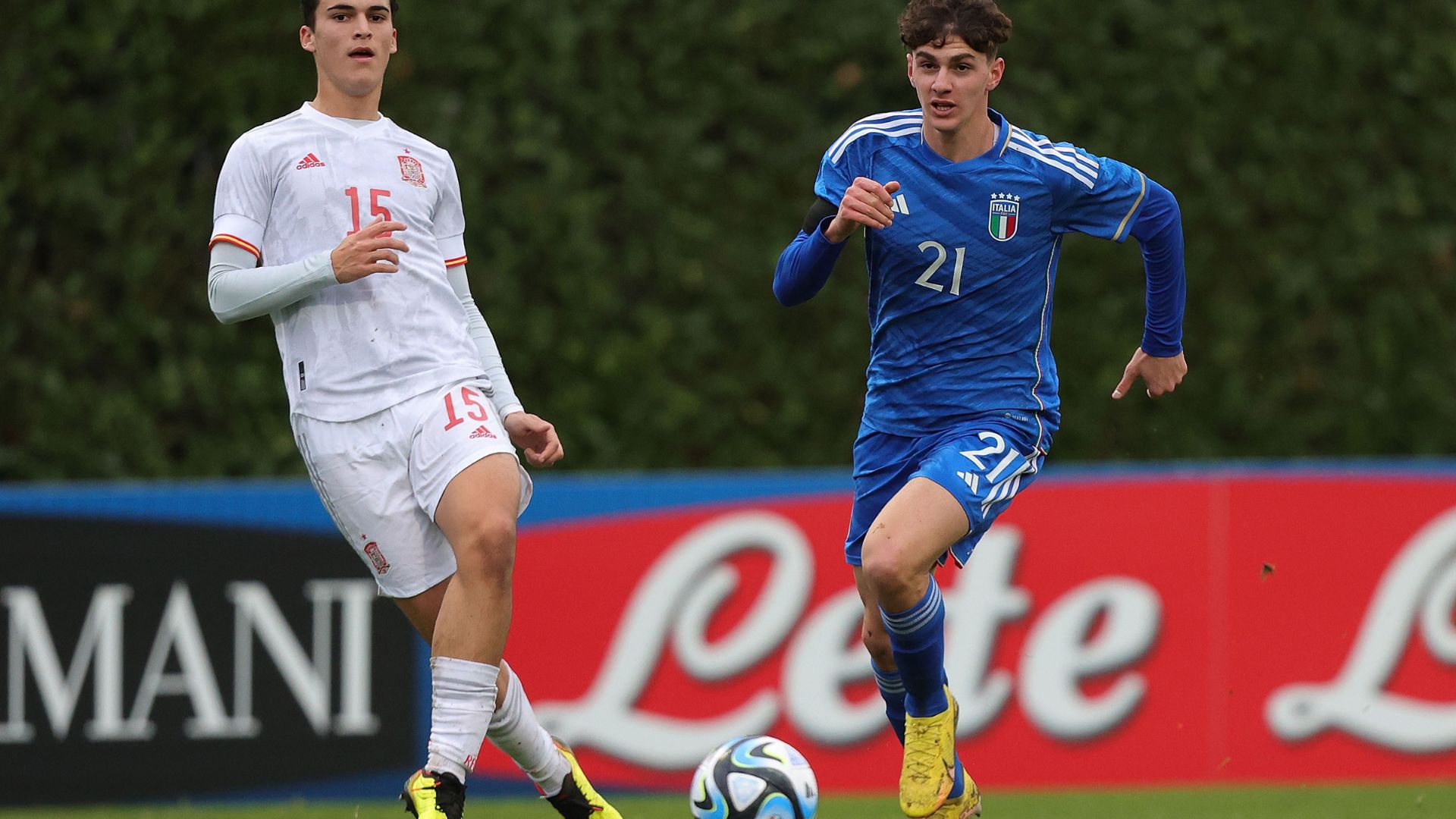 FLORENCE, ITALY - JANUARY 18: Lorenzo Anghele' of Italy U18 battles for the ball with Alvaro Cortes of Spain U18 at Centro Tecnico Federale di Coverciano on January 18, 2023 in Florence, Italy.
