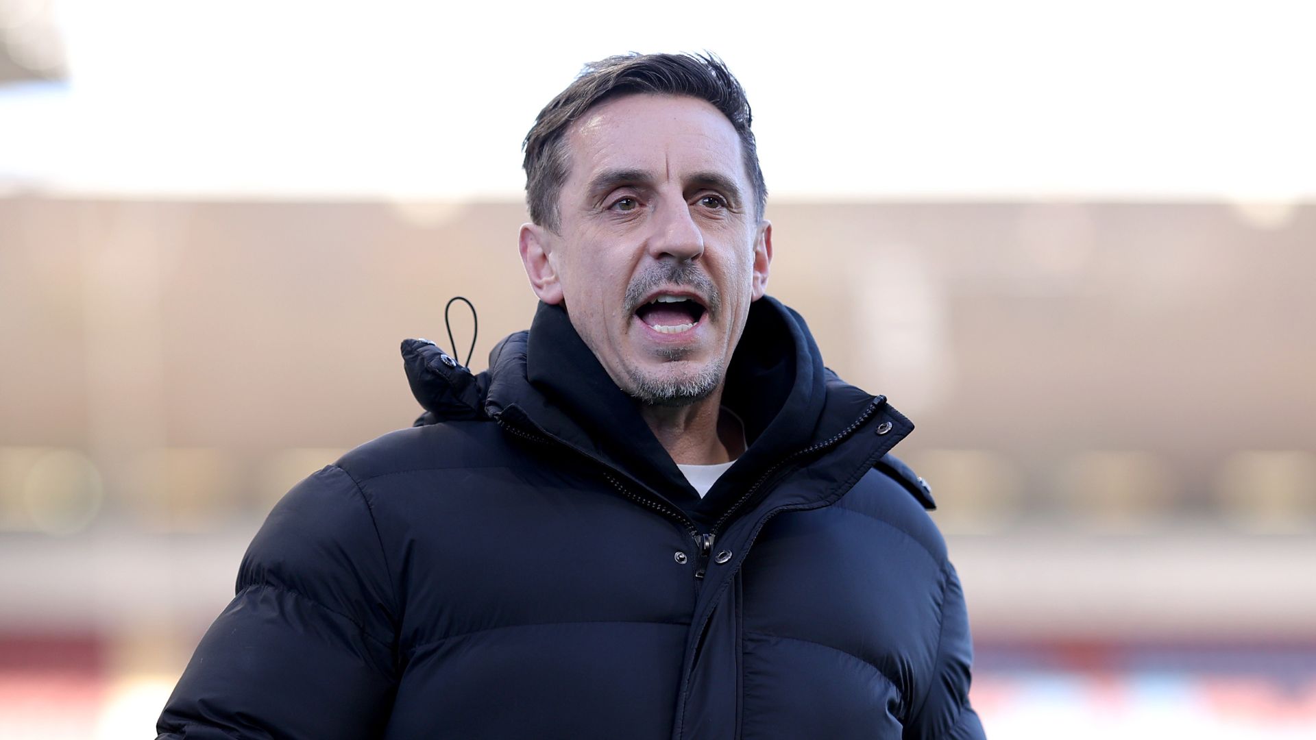 Pundit Gary Neville, arrives at the stadium prior to the Premier League match between Burnley and Manchester City at Turf Moor on April 22, 2026 in Burnley, England.