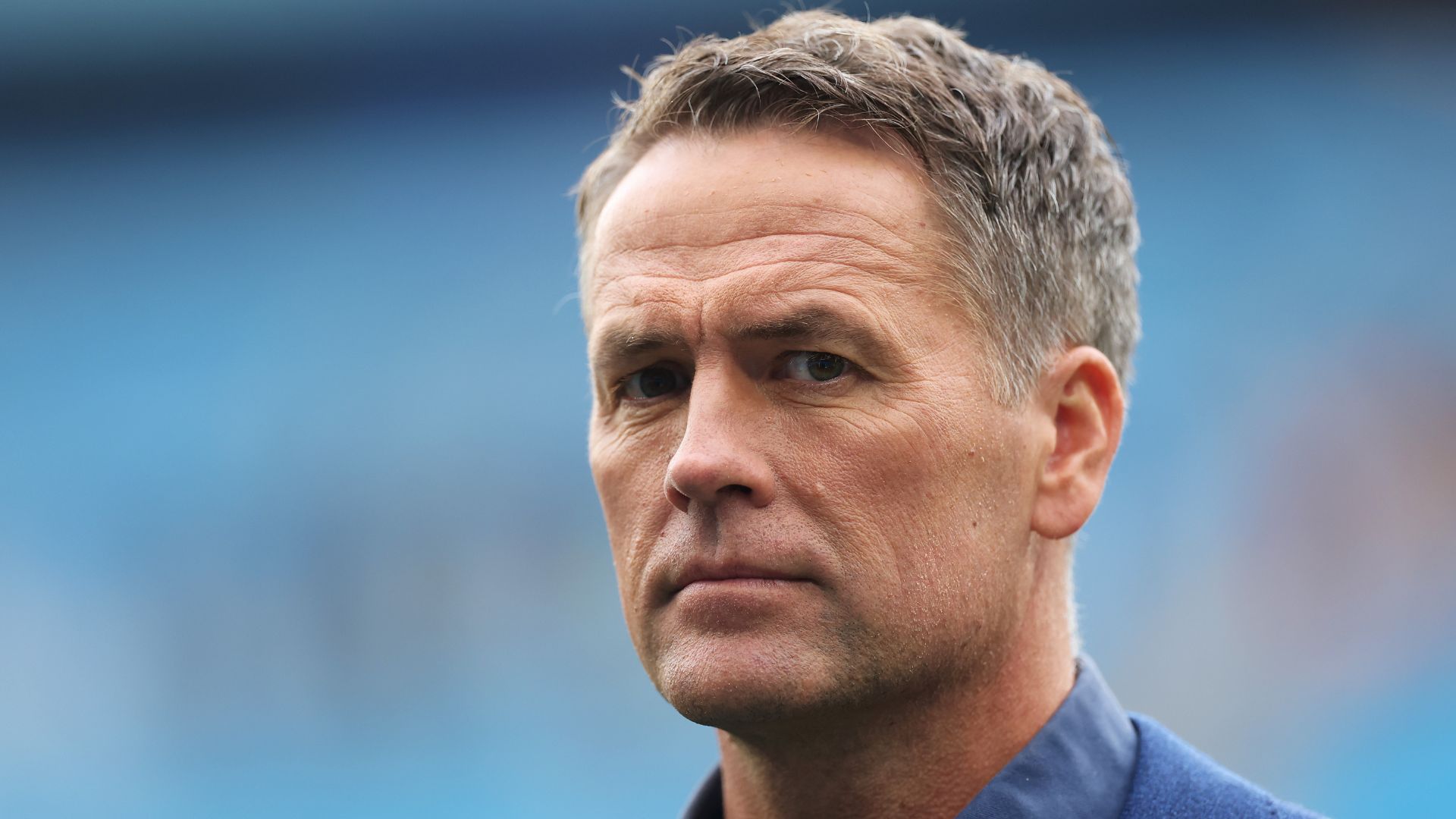 Michael Owen looks on prior to the Premier League match between Manchester City and Manchester United at Etihad Stadium on September 14, 2025 in Manchester, England.