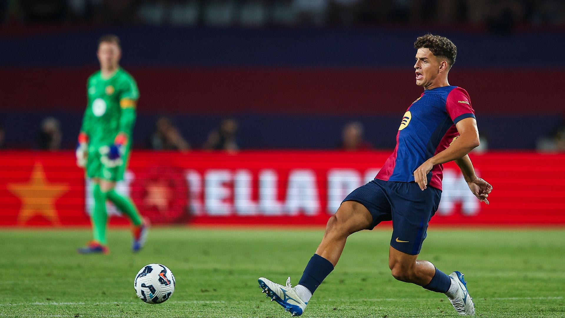 BARCELONA, SPAIN - AUGUST 12: Sergi Dominguez of FC Barcelona run with the ball during the Joan Gamper Trophy match between FC Barcelona and AS Monaco at Estadi Olimpic Lluis Companys on August 12, 2024 in Barcelona, Spain.