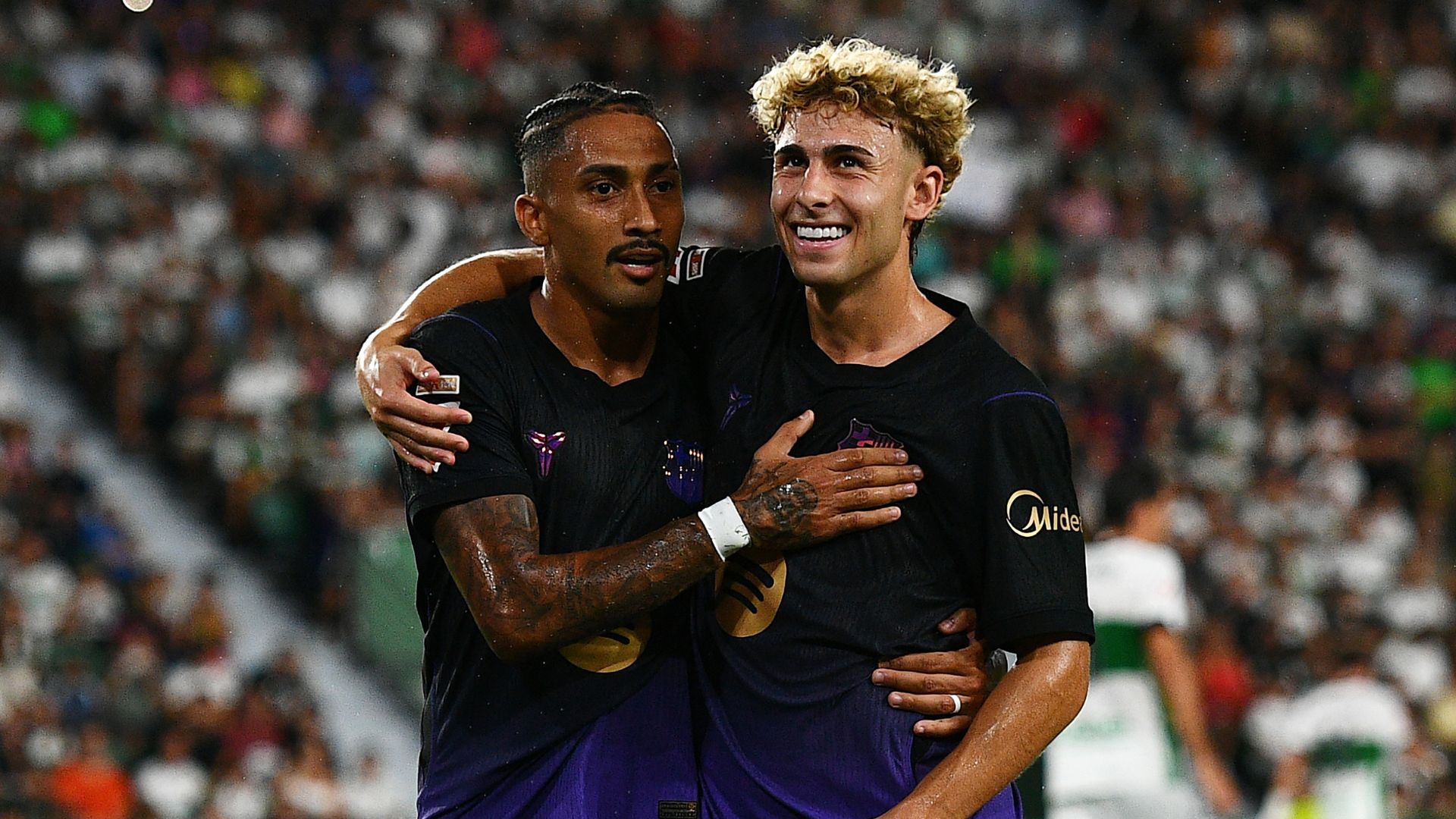 ELCHE, SPAIN - AUGUST 23: Raphinha of Barcelona celebrates scoring his team’s first goal with team mate Fermin Lopez during the LaLiga EA Sports 2026/27 match between Elche CF and FC Barcelona at Estadio Manuel Martinez Valero on August 23, 2026 in Elche, Spain.